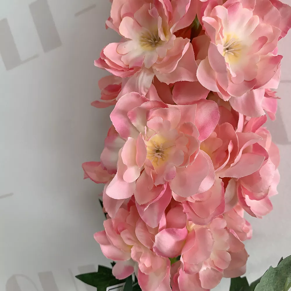 Elegant white faux delphinium flowers with silk petals for centerpiece