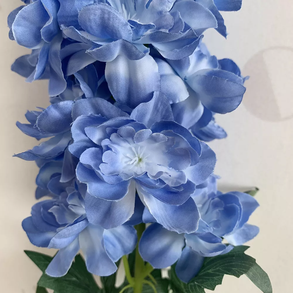 Faux delphinium flowers for wedding arch and floral wall display