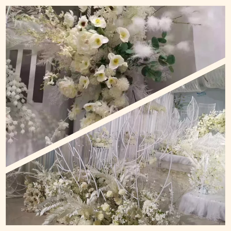 White artificial flower garlands decorating wedding stage and ceiling